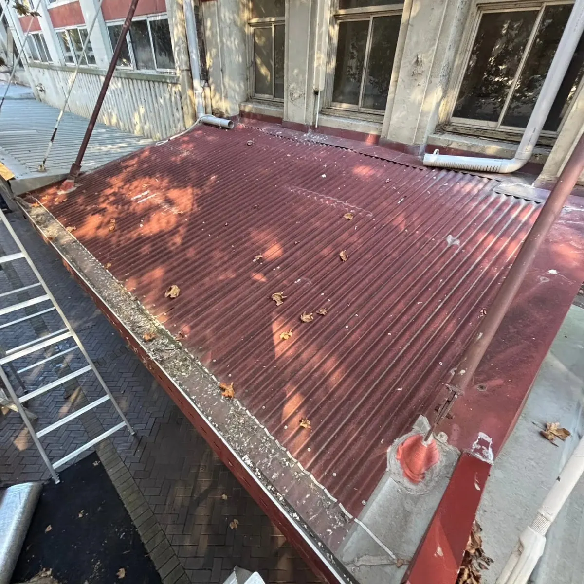 Heritage awning re-sheet: before