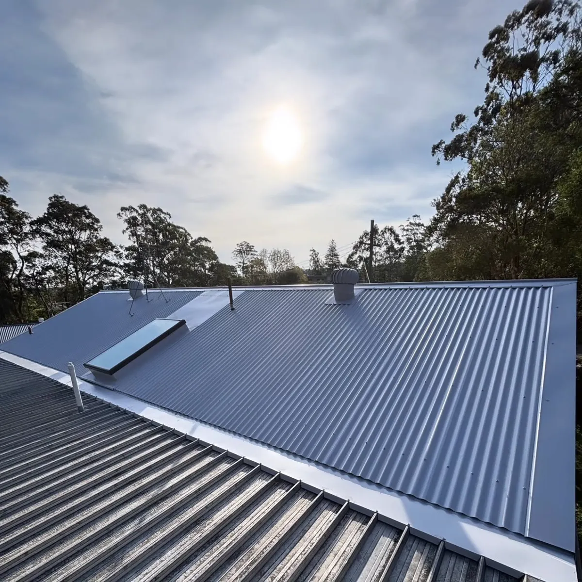 Finished metal roof with a skylight set into the sheeting