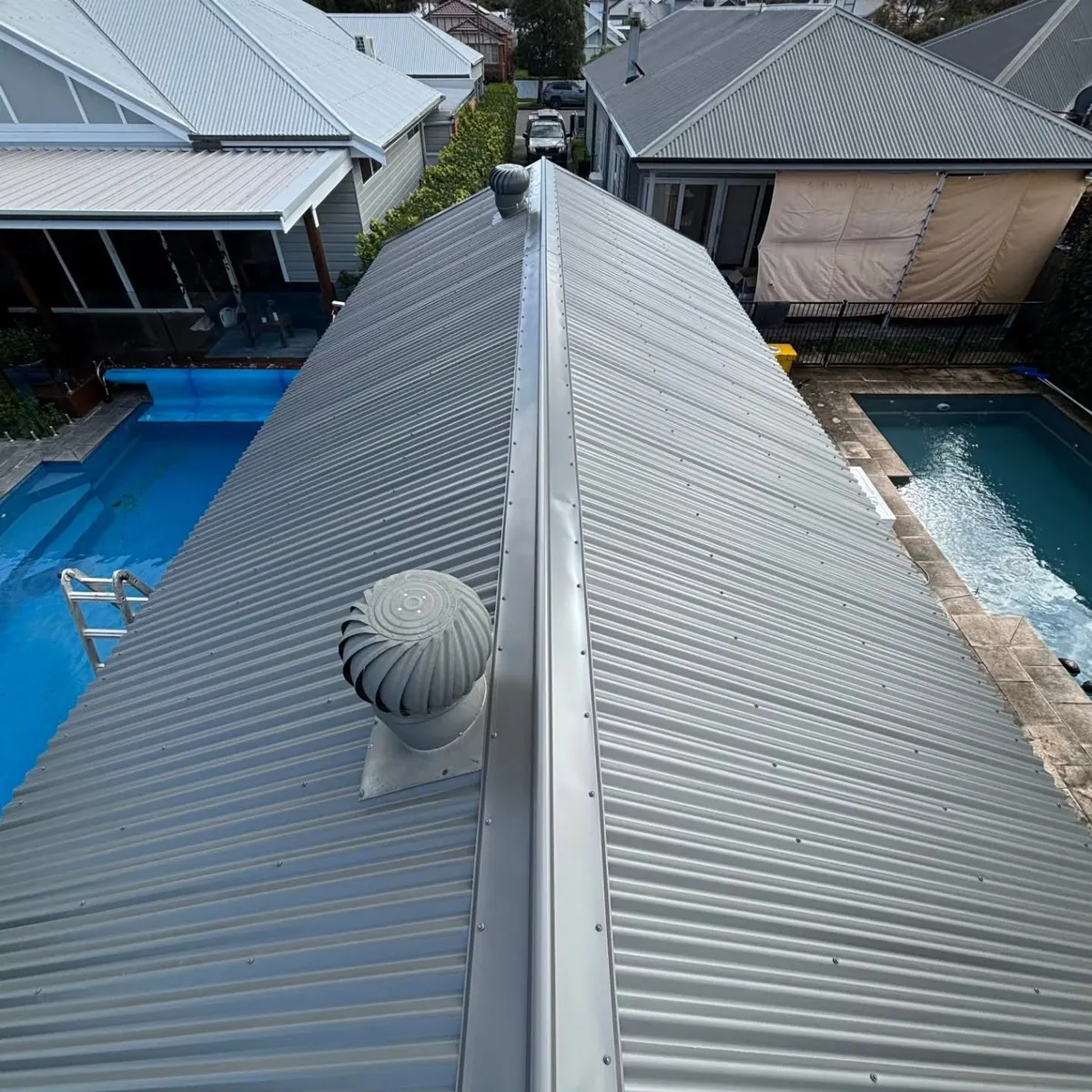 Re-roof beside a pool: after