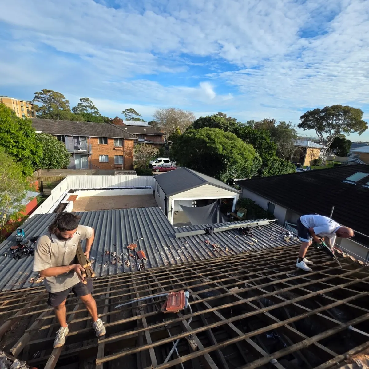 Taking an old tile roof off, down to the timber frame